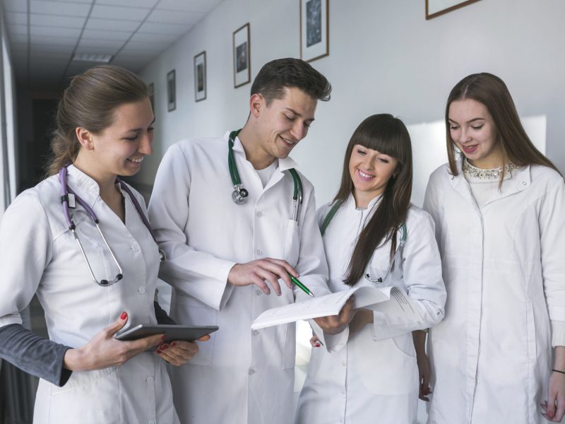 male-female-medics-with-papers