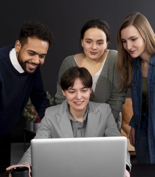 trans-person-working-office-with-colleagues